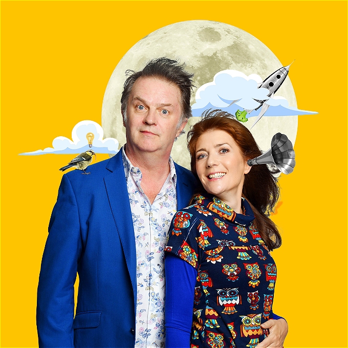 Two comedians in front of a yellow background