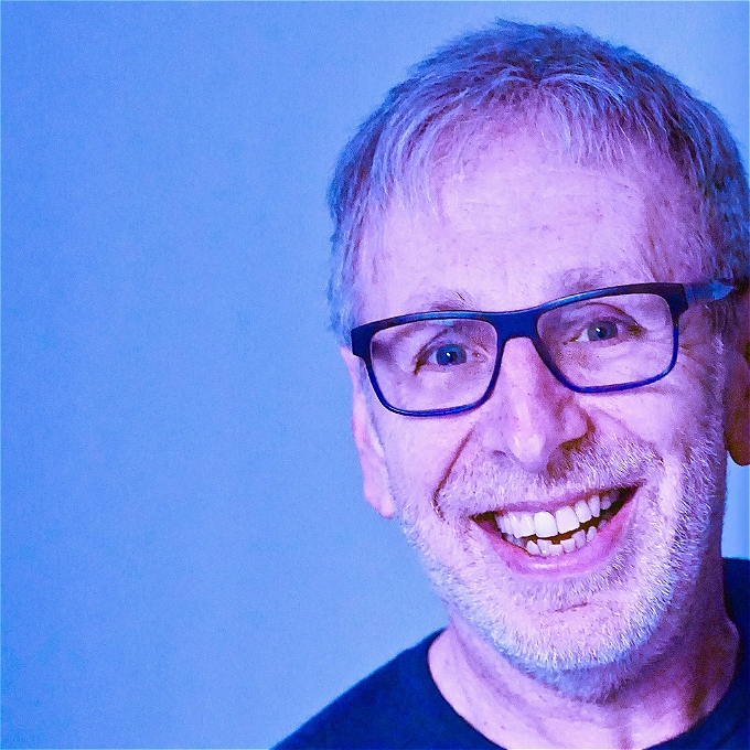 A smiling bespectacled Ian Stone