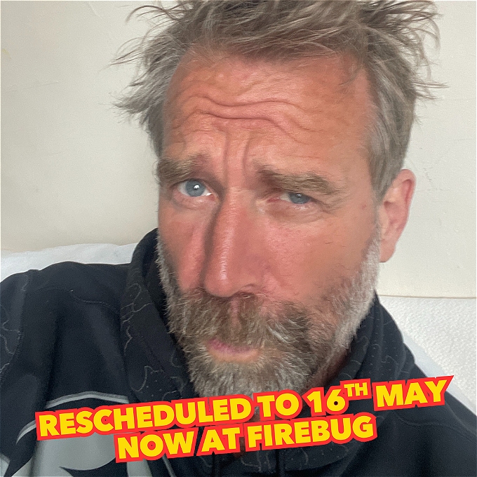 Tony Law looking smoking hot smolders at the camera