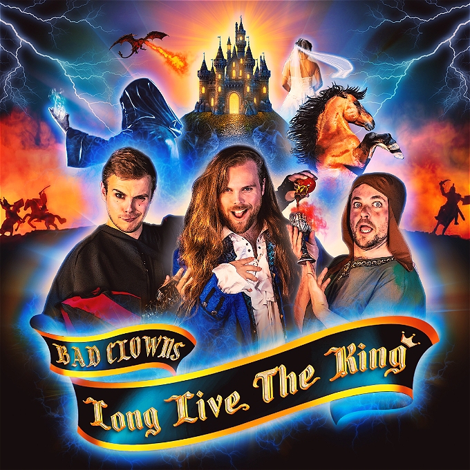 3 men stand in front of a medieval fantasy land