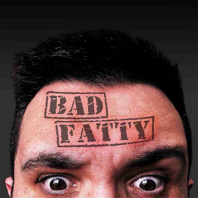 Closeup image of fat comedians face