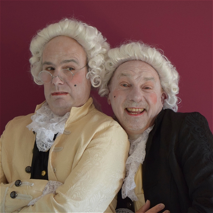 Two Lords from the Georgian period, with white wigs and frock coats