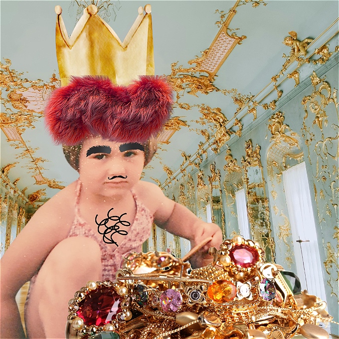 baby with crown and pile of jewels