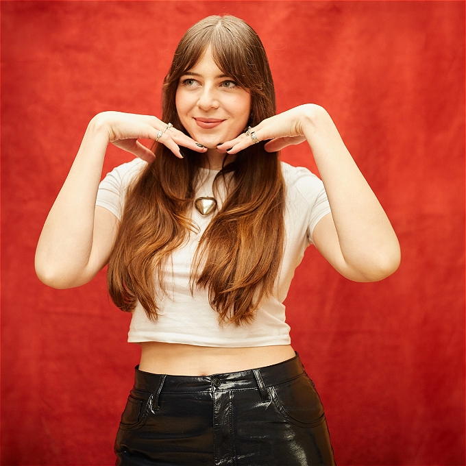 Female comedian looking cheeky