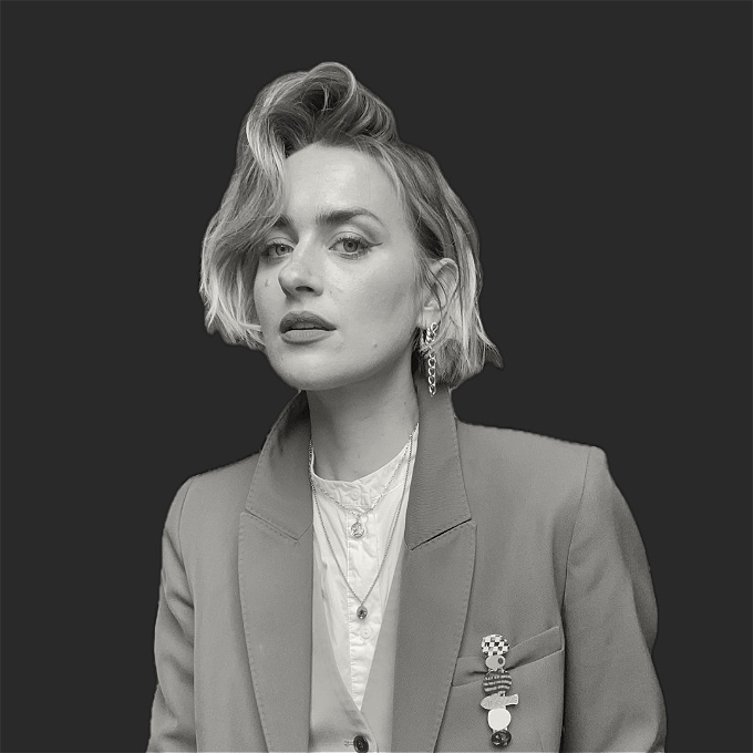 Black and white picture of Amy Matthews smoldering at the camera