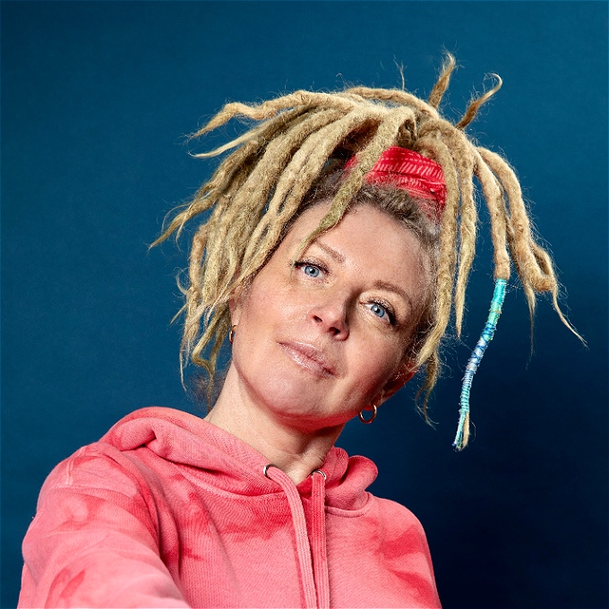 female comedian with dreadlocks
