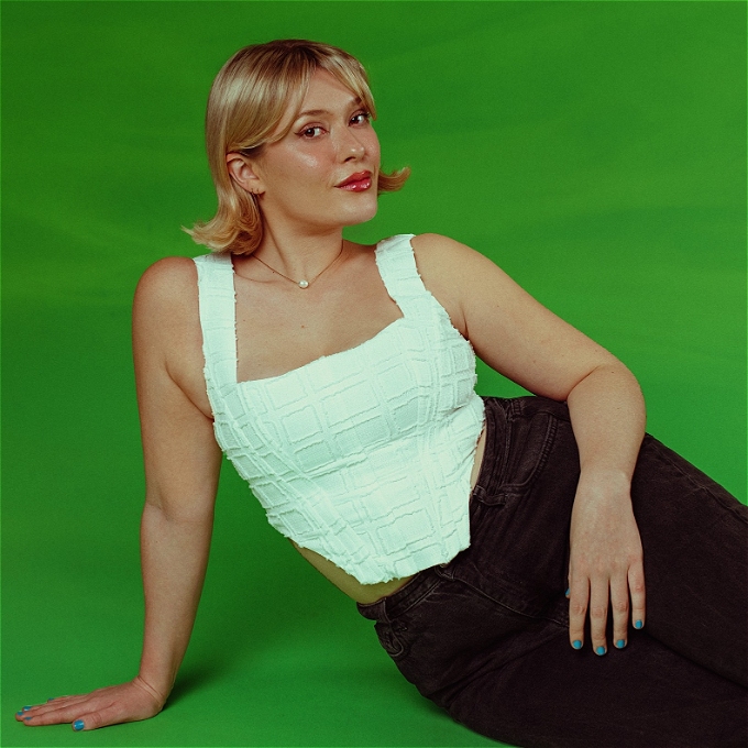 A demure Cecily Hitchcock smiles at the camera