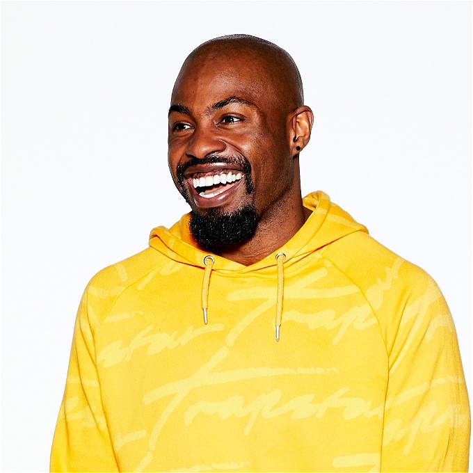 Darren smiling his face off dressed like a banana