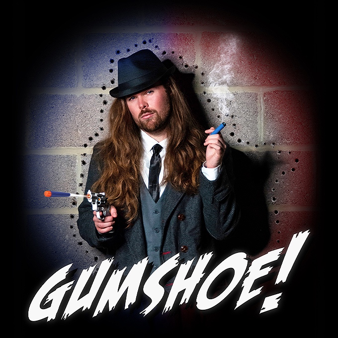 Detective holding an e-cigarette and nerf gun stood in the middle of a spotlight surrounded by bullet holes