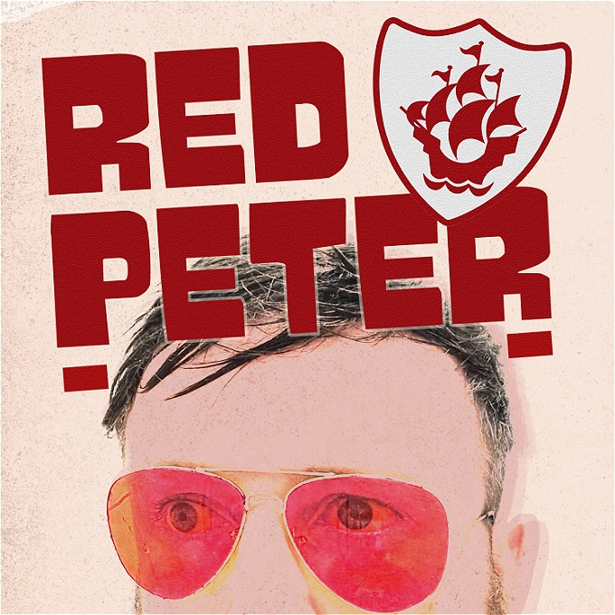 KEV MUD WITH RED GLASSES ON UNDER THE RED PETER LOGO