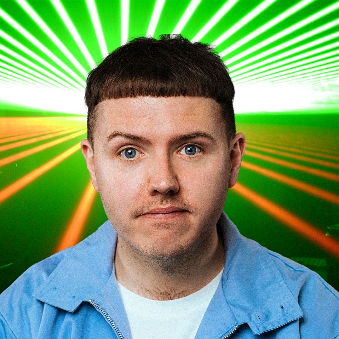 Adam Flood in front of nightclub lighting