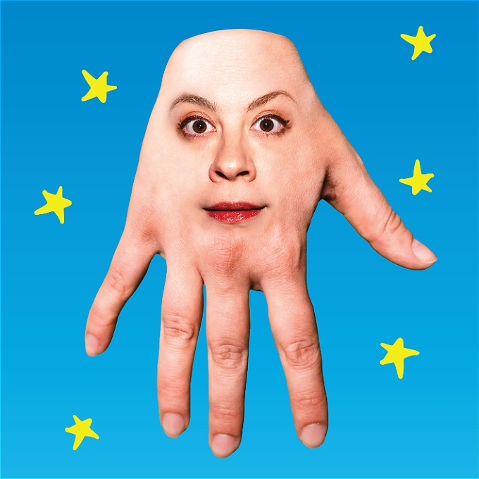 Hand with a woman's face on it, on a blue background, with yellow illustrated stars