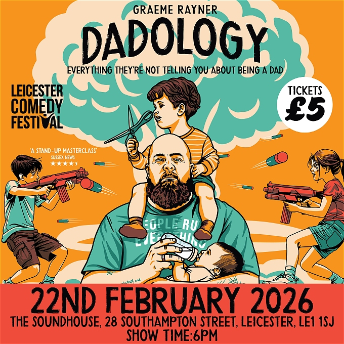 A bald, bearded man with tattoos is holding a baby and feeding it from a bottle while another child sits on his shoulders waving a pair of scissors. In the background two children are firing toy guns at one another,