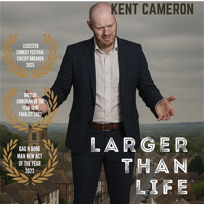 A giant is depicted standing amongst a typical English village, the houses are not more than knee height