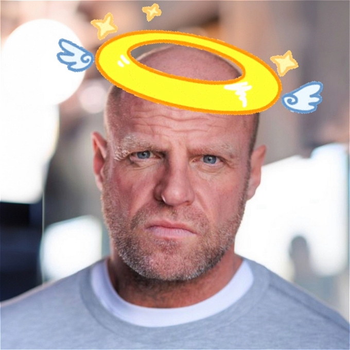 Big, scary, tough looking male comedian with a halo