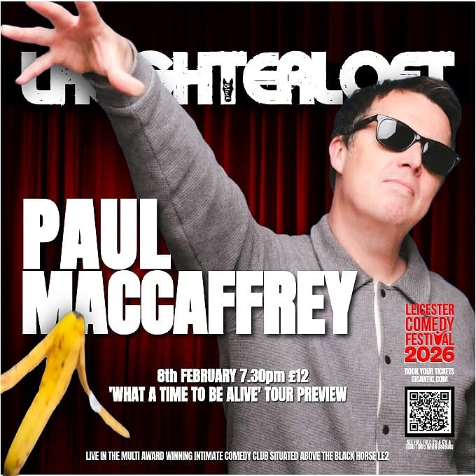 Man in Sunglasses in front of show curtain dropping a banana skin