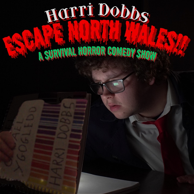 Curly haired comedian looking shocked at a glowing storybook